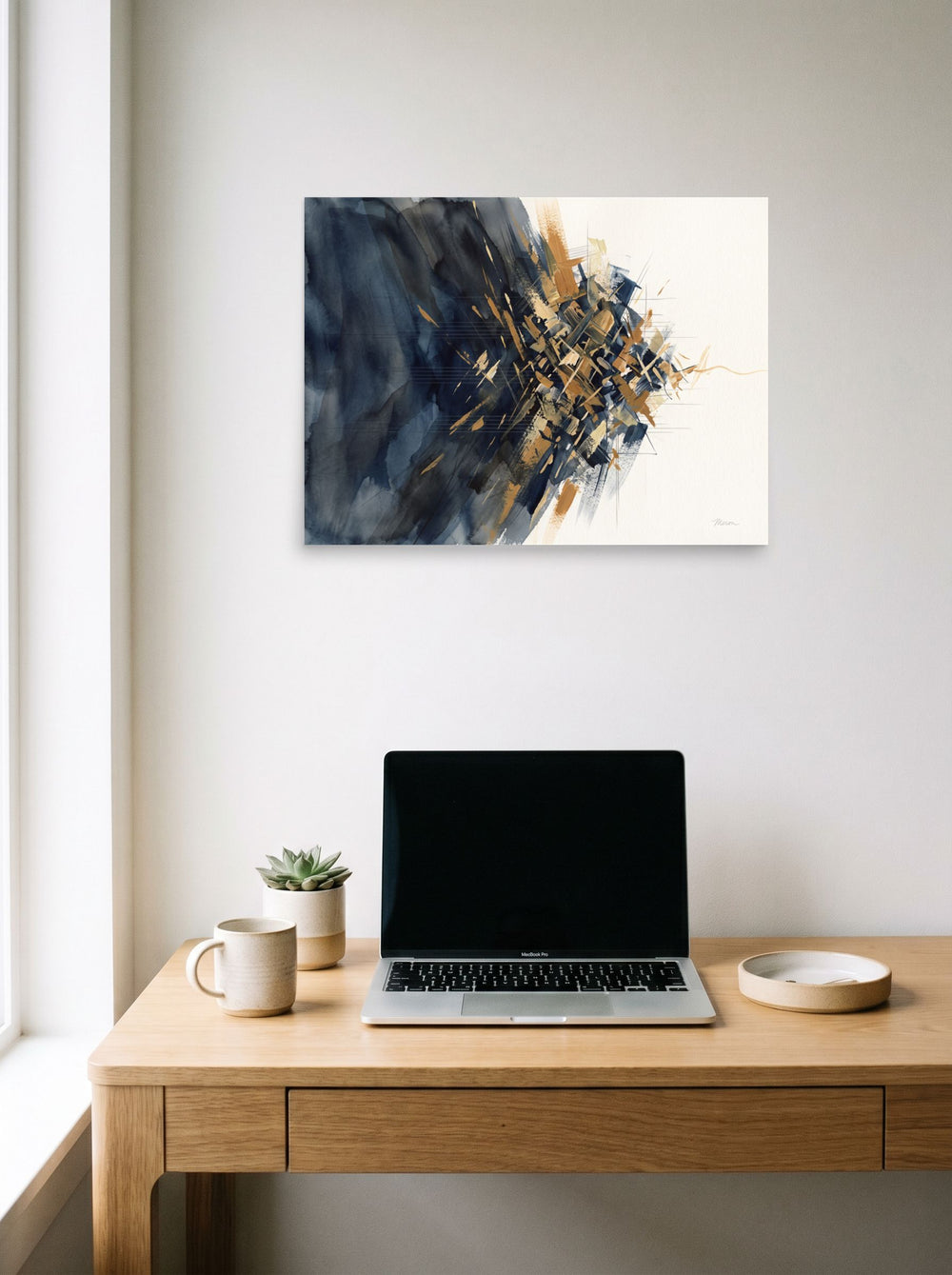 The Abstract art print 'Mineral Rift', 24x18 inch unframed paper, displayed over a compact desk setup.