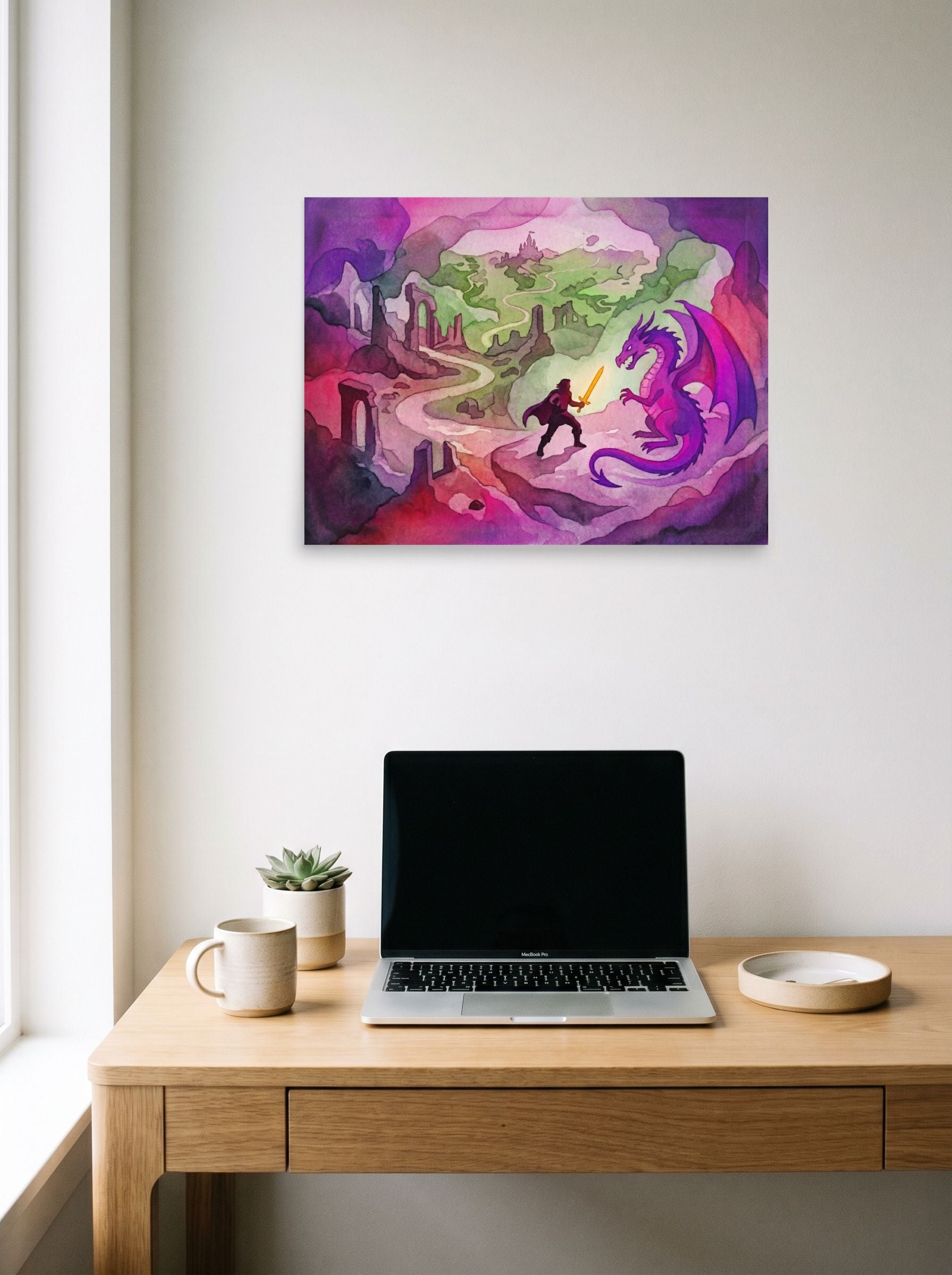 A 24x18 inch unframed paper Fantastic realism print of 'The Dragon's Challenge' hanging above a worktable with a laptop.