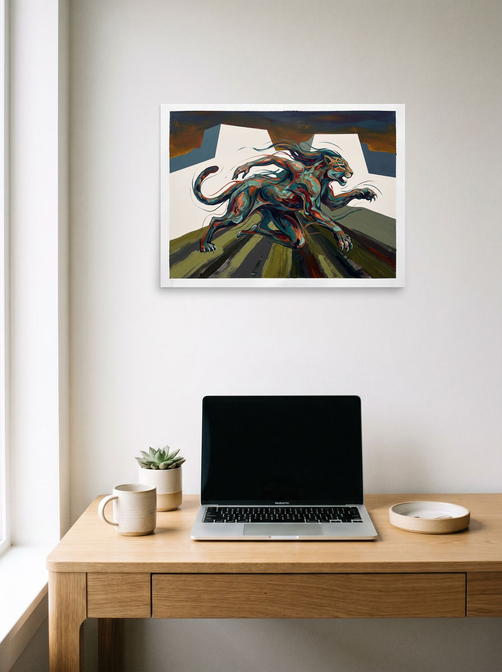 A unframed paper print of the Expressionism artwork 'Jaguar Spirit Bounds', styled above a home-office workspace.