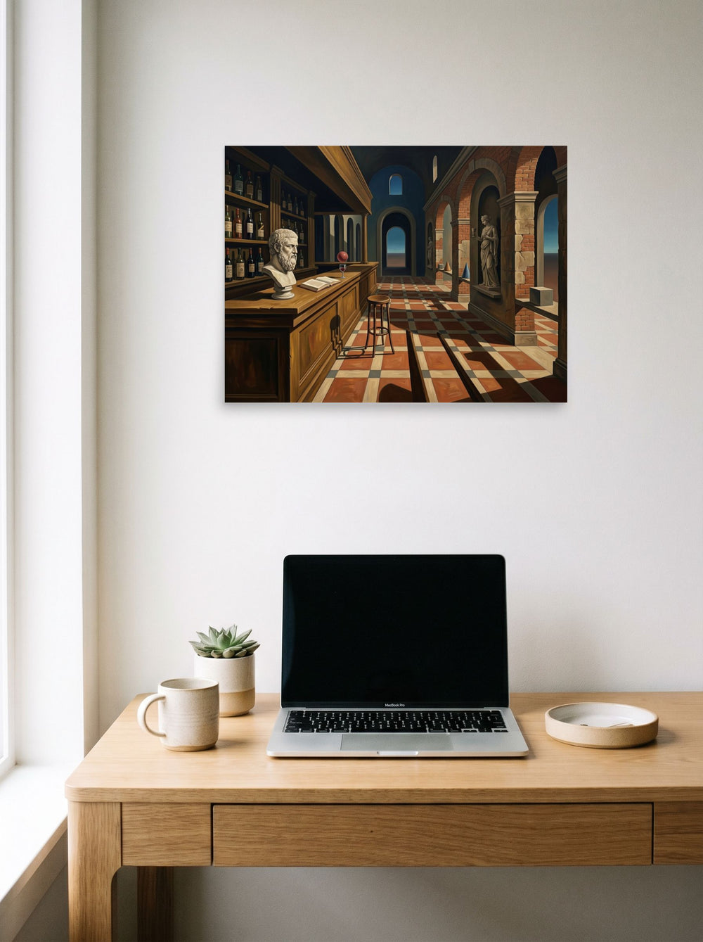A 24x18 inch unframed paper Metaphysical painting print of 'The Philosopher's Tavern' hanging above a worktable with a laptop.