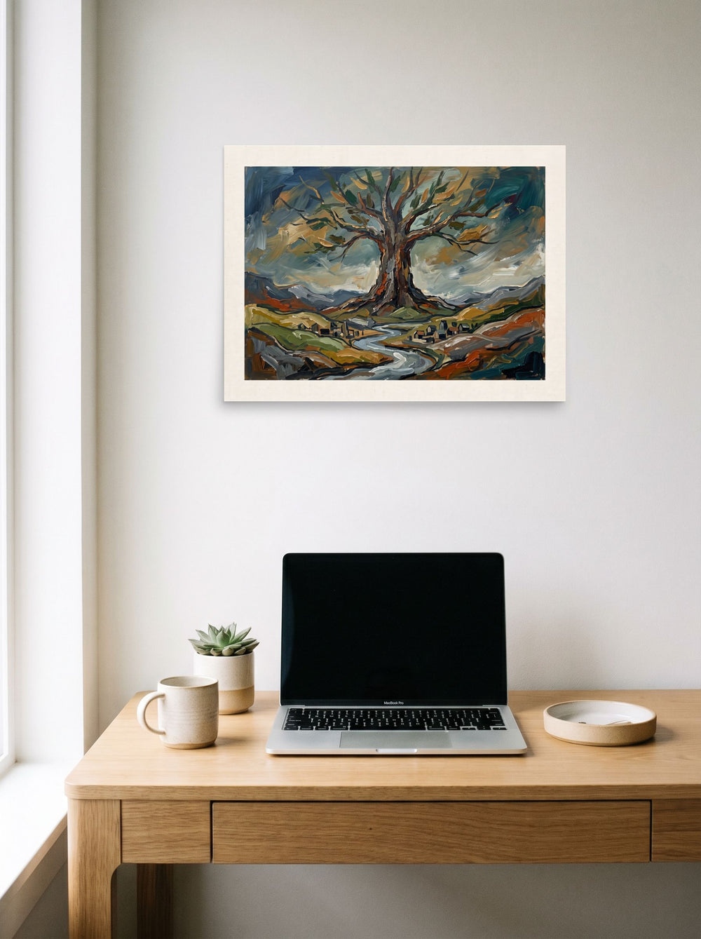 'Roots of Yggdrasil' hanging above a worktable with a laptop. A 24x18 inch unframed paper Expressionism print.