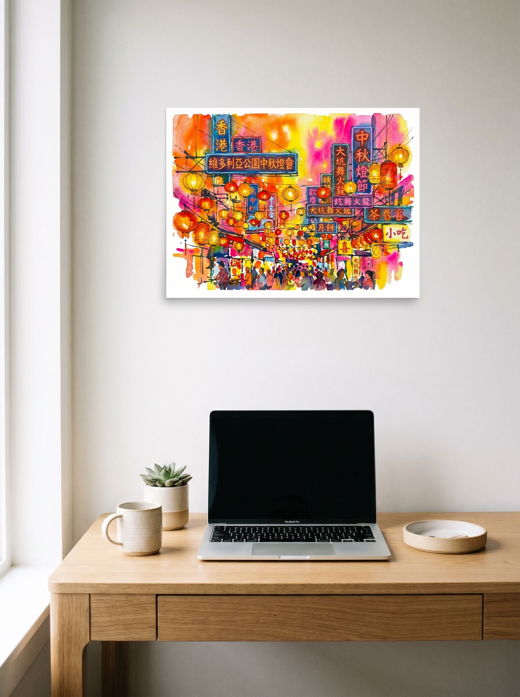 A 24x18 inch unframed paper Fauvism print of 'Lantern Festival Glow' hanging above a worktable with a laptop.