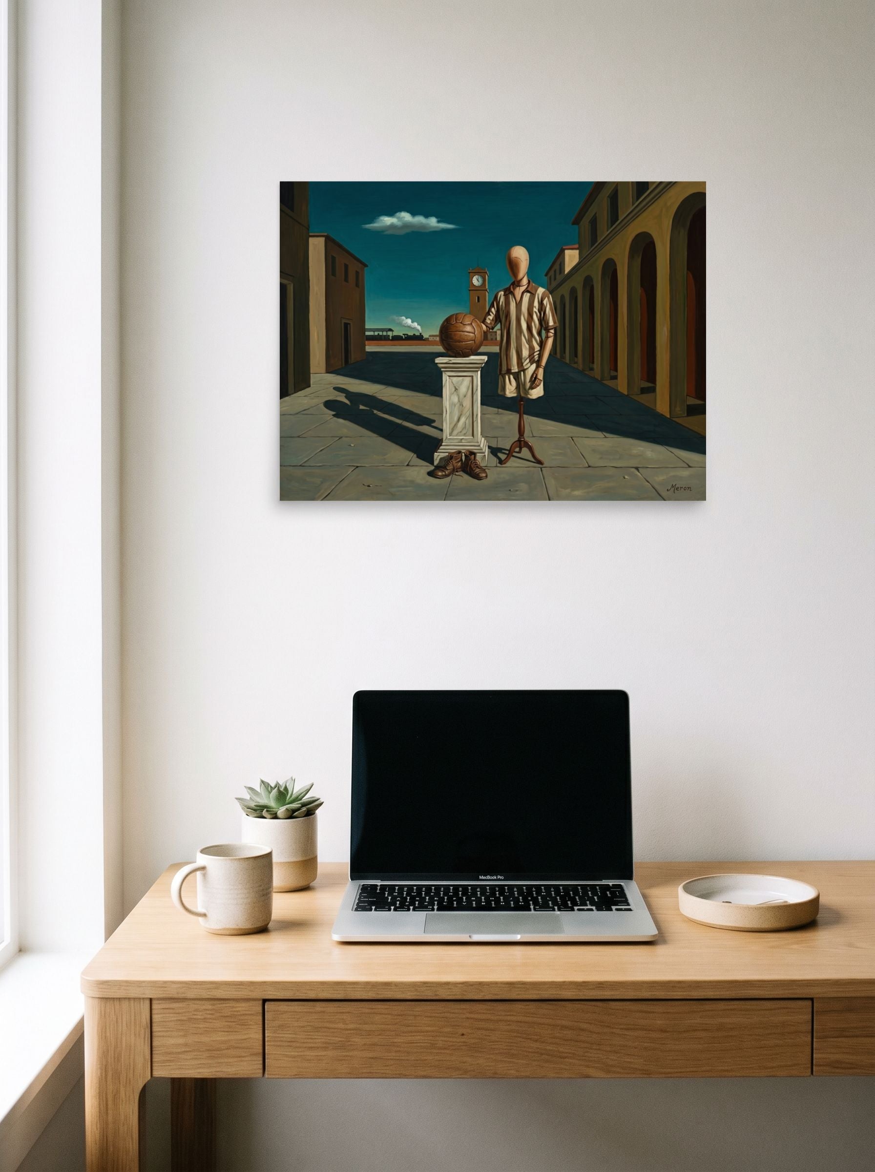 A 24x18 inch unframed paper Metaphysical painting print of 'The Athlete's Illusion' hanging above a worktable with a laptop.