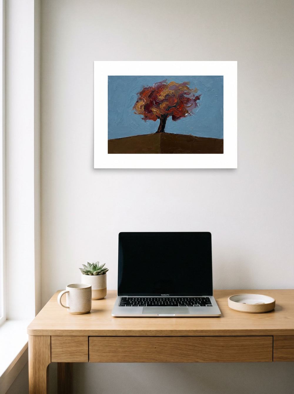 'The Lone Autumn' in 24x18 inch unframed paper, displayed over a compact desk setup.