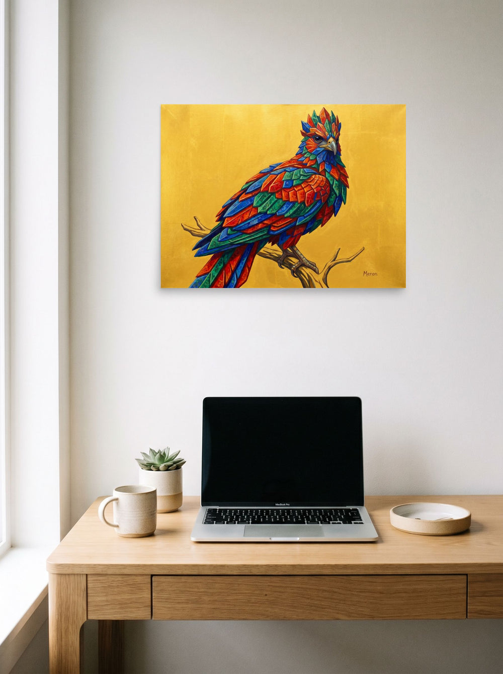 A 24x18 inch unframed paper Geometric abstract art,Surrealism print of 'The Gemstone Falcon' hanging above a worktable with a laptop.