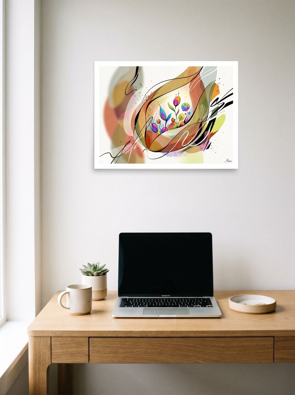 'Lyrical Blooms in Warm Light', a Lyrical abstraction print displayed over a compact desk setup. Shown as unframed paper, 24x18 inch.