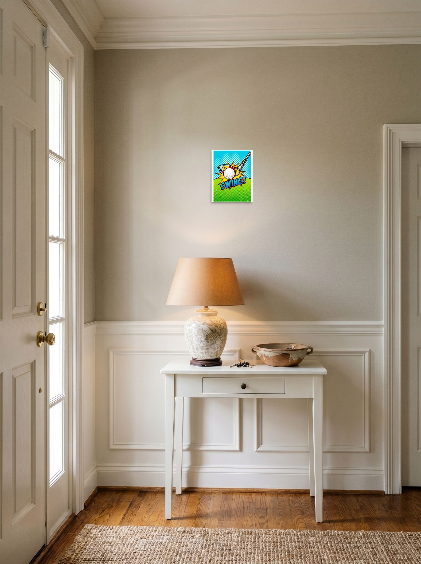 A 8x10 inch unframed paper Pop art print of 'Comic Swing' hanging in an entryway near a console.