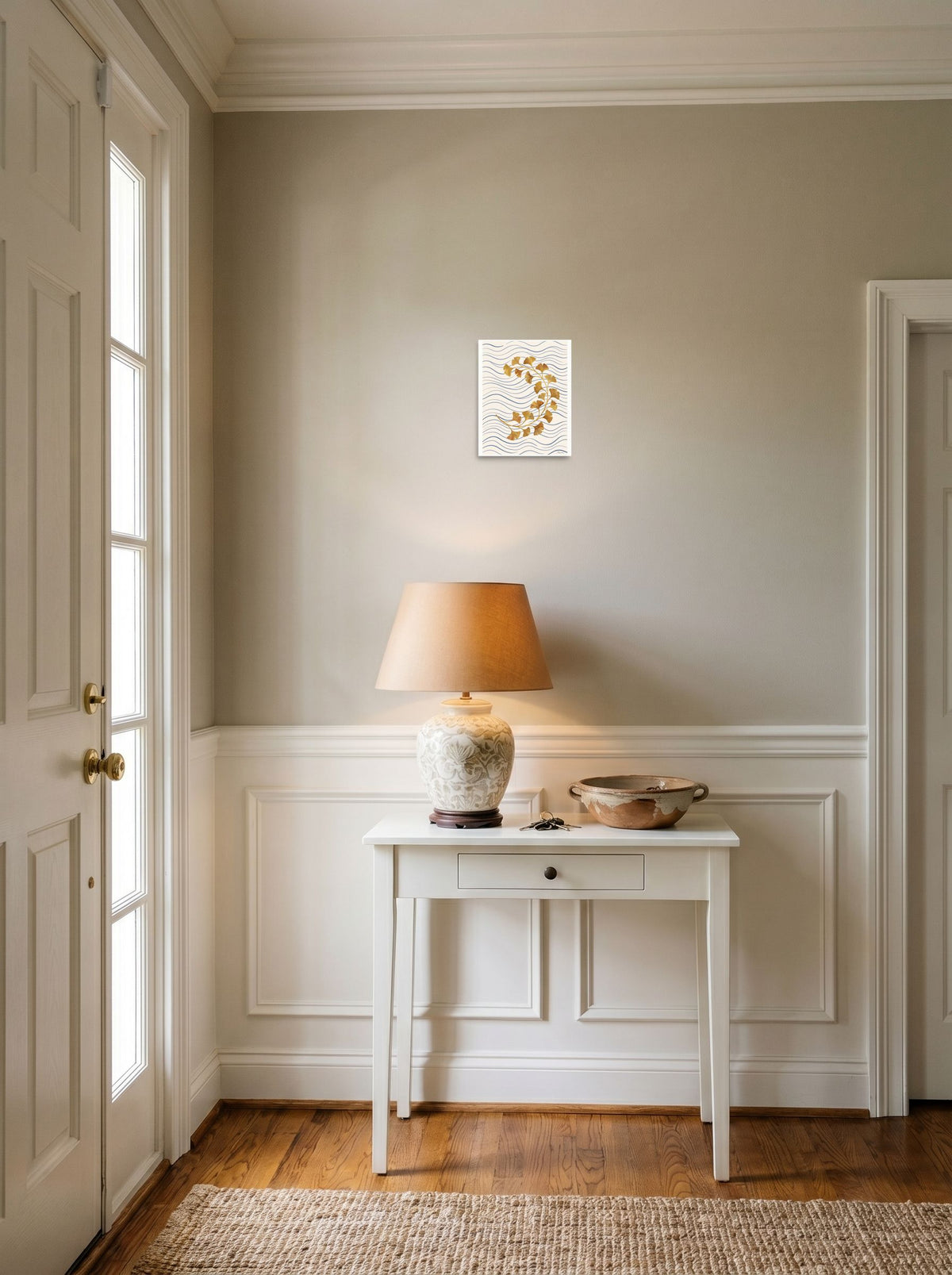 Mockup of 'Golden Ginkgo Breeze' as a 8x10 inch unframed paper print, styled above a console table in an entryway.