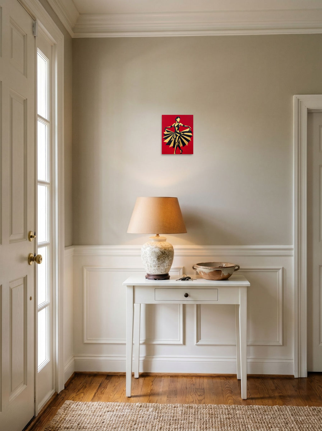 A 8x10 inch unframed paper Art Deco,Cubism print of 'The Golden Dancer' hanging in an entryway near a console.