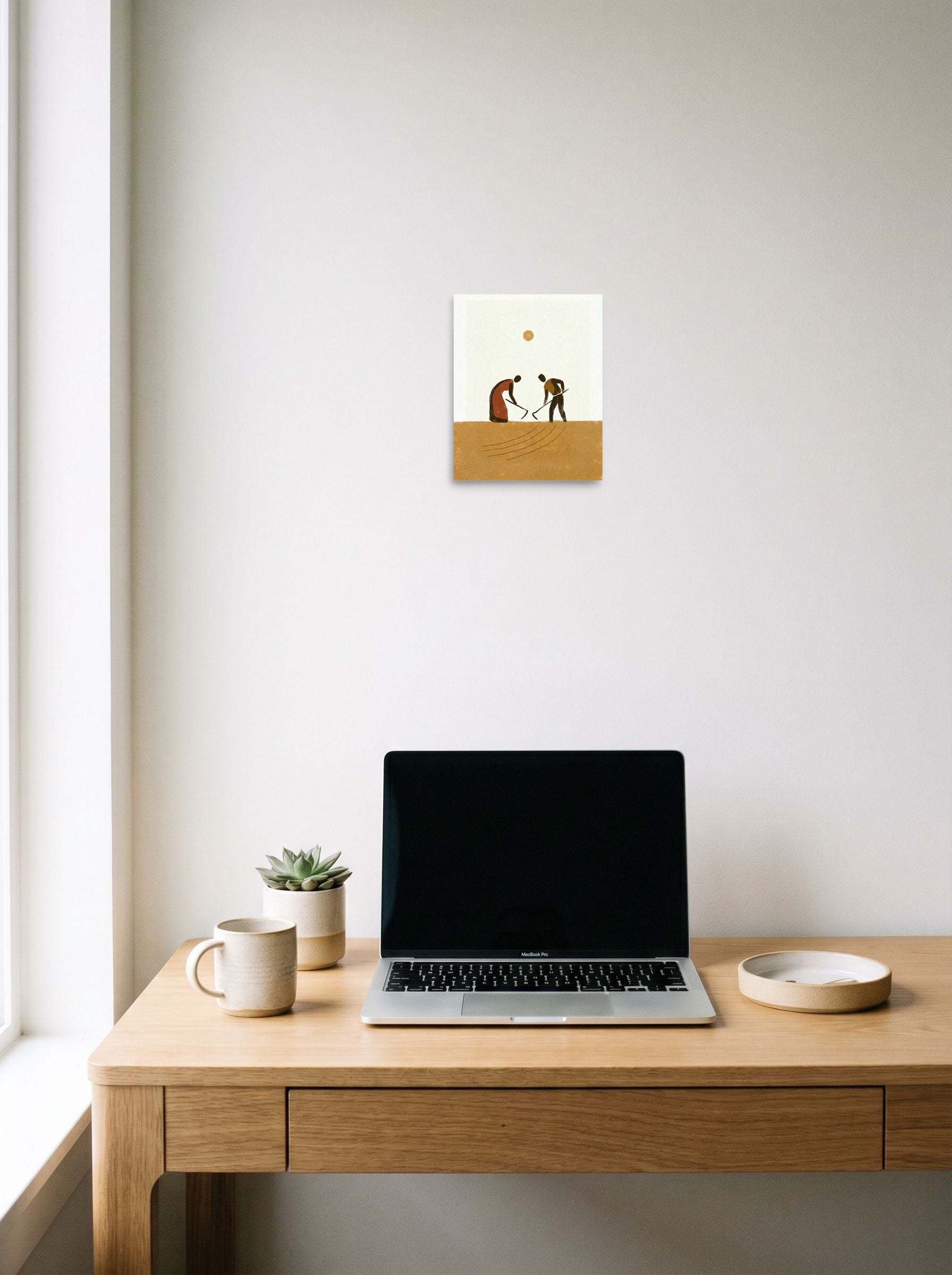 A 8x10 inch unframed paper Minimalism,Modernism print of 'Harvest Rhythm' hanging above a worktable with a laptop.