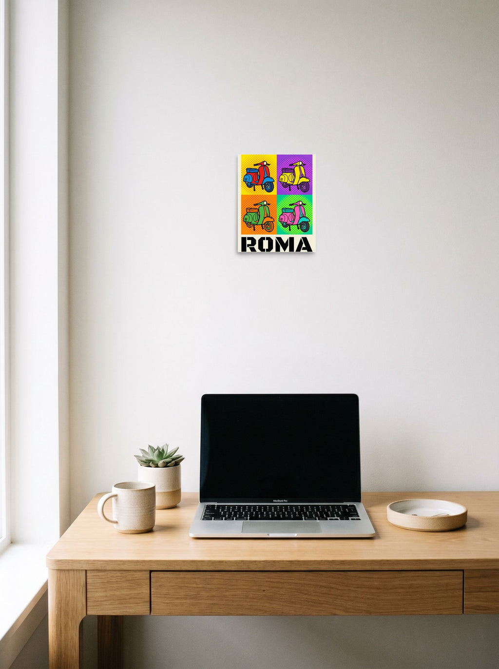 A 8x10 inch unframed paper Pop art print of 'Roma Scooter Pop' hanging above a worktable with a laptop.