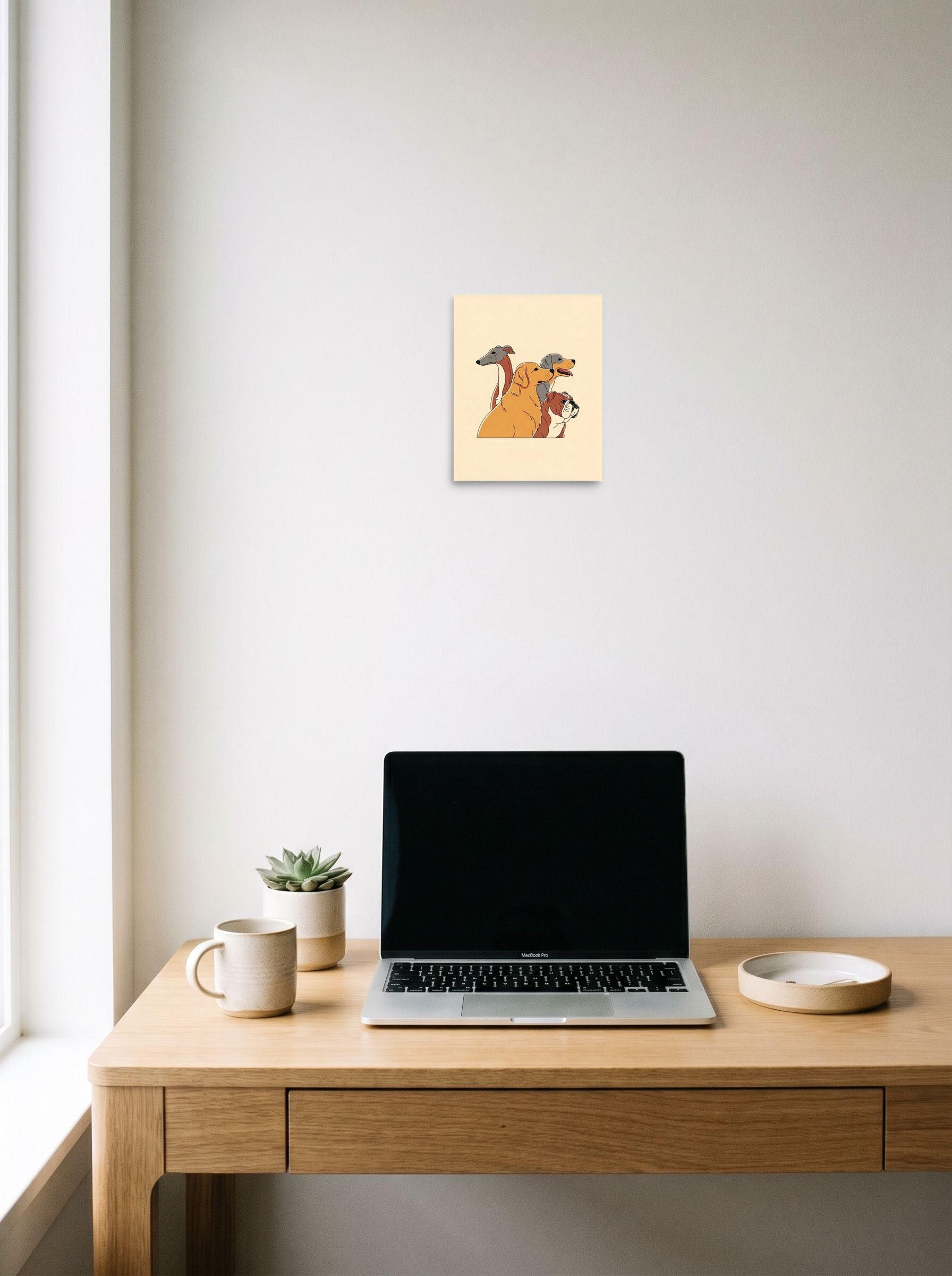 A 8x10 inch unframed paper Digital art,Pop art print of 'The Canine Trio' hanging above a worktable with a laptop.