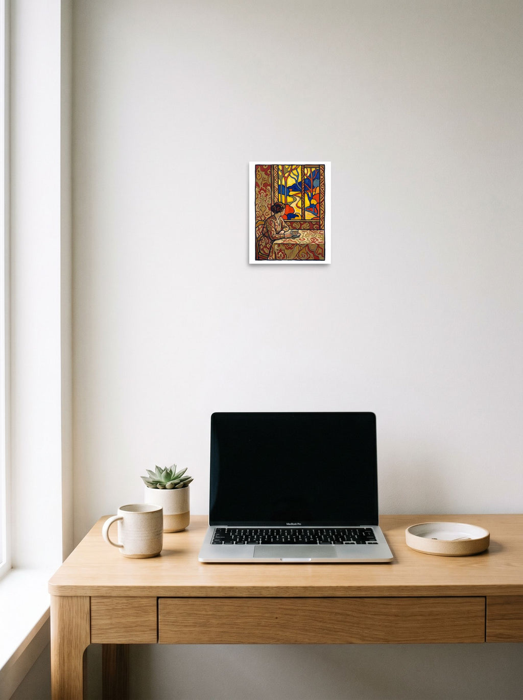 'Morning Window' in 8x10 inch unframed paper, hanging above a worktable with a laptop.