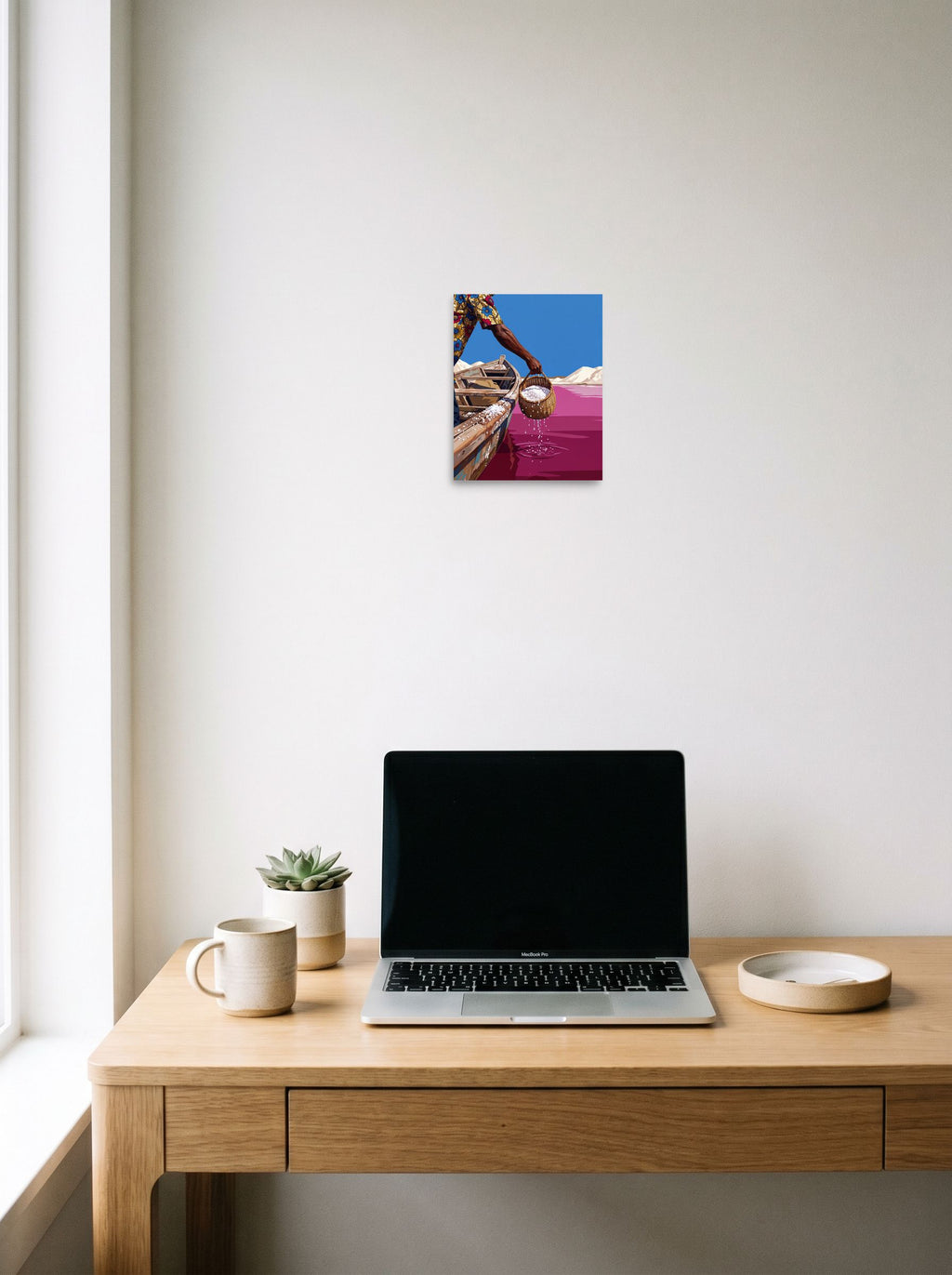 The unframed paper print 'Pink Lake Harvest' hanging above a worktable with a laptop, shown at 8x10 inch.