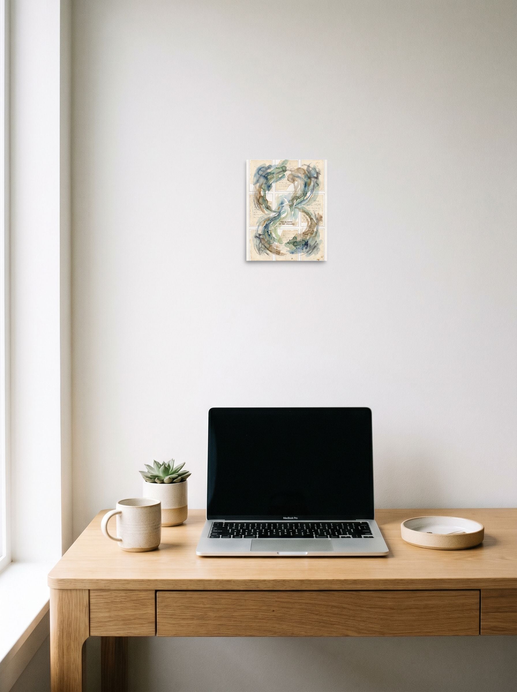 8x10 inch unframed paper print of 'The Alchemy of the Ordinary', styled above a home-office workspace.